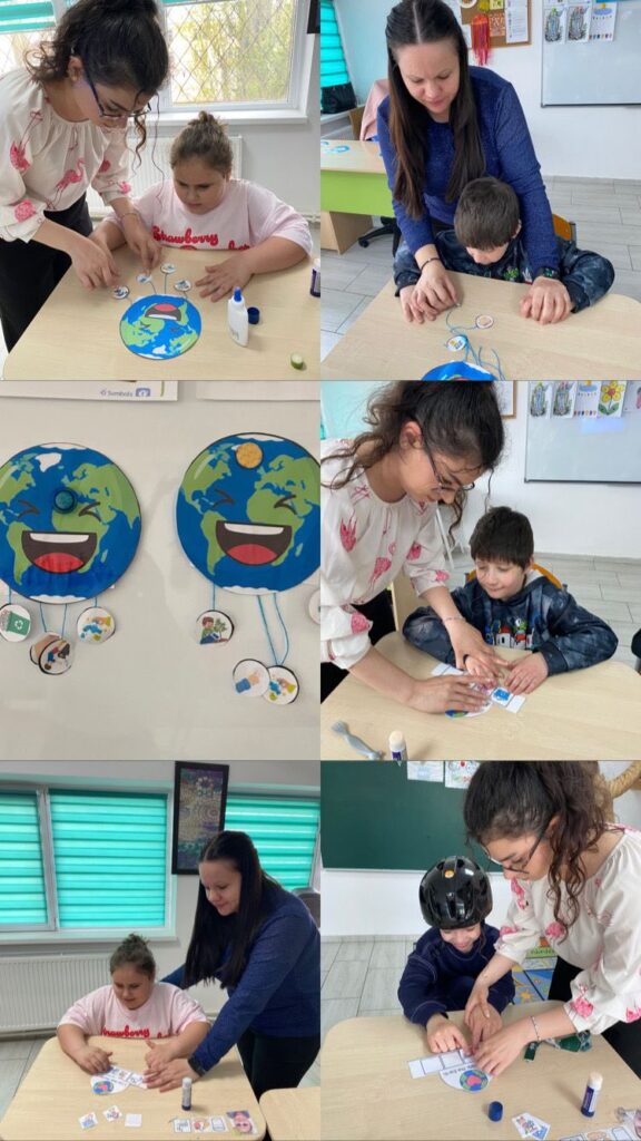 Elevi realizează colaj cu planeta pământ