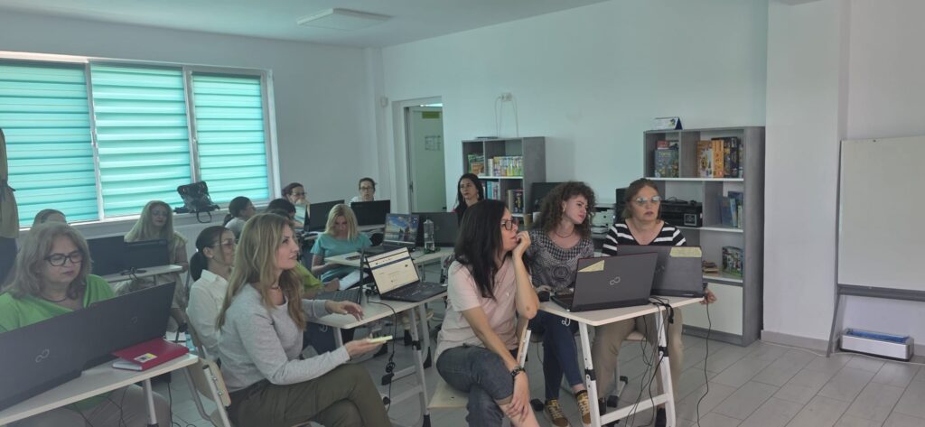 teachers listening to instructor