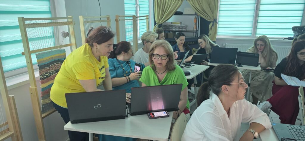 teachers working on their laptops connecting to etwinning
