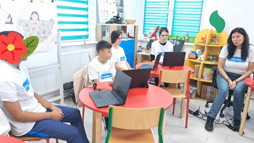 Elevii urmăresc instrucțiunile profesorului